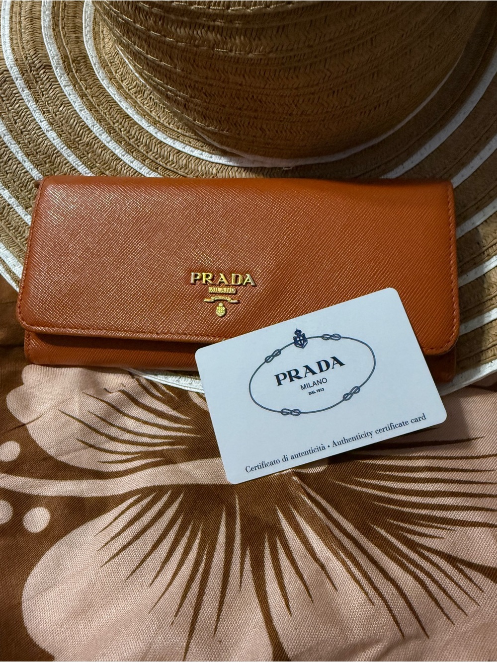 Prada Saffiano Leather Continental Wallet in Burnt Orange with Gold Logo